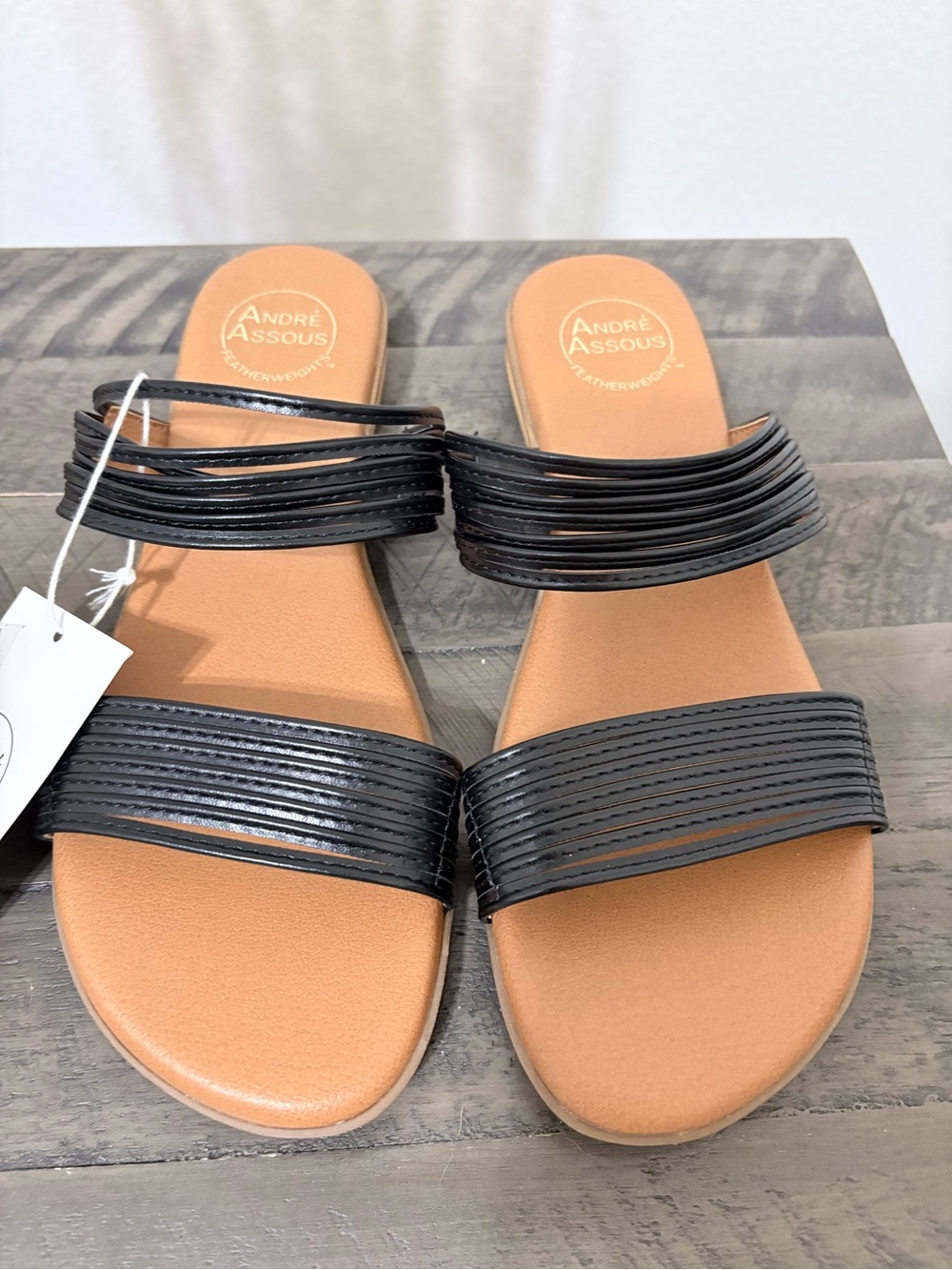 Andre Assous Black Double-Strap Slide Sandals with Tan Footbed